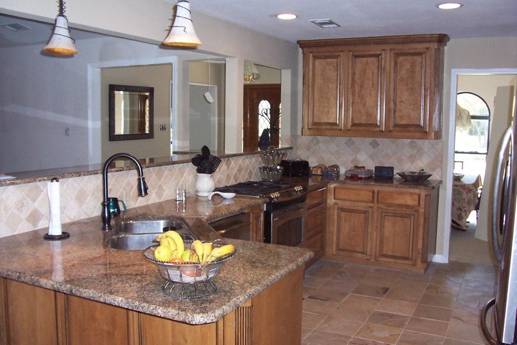 Open concept kitchen with built granite top