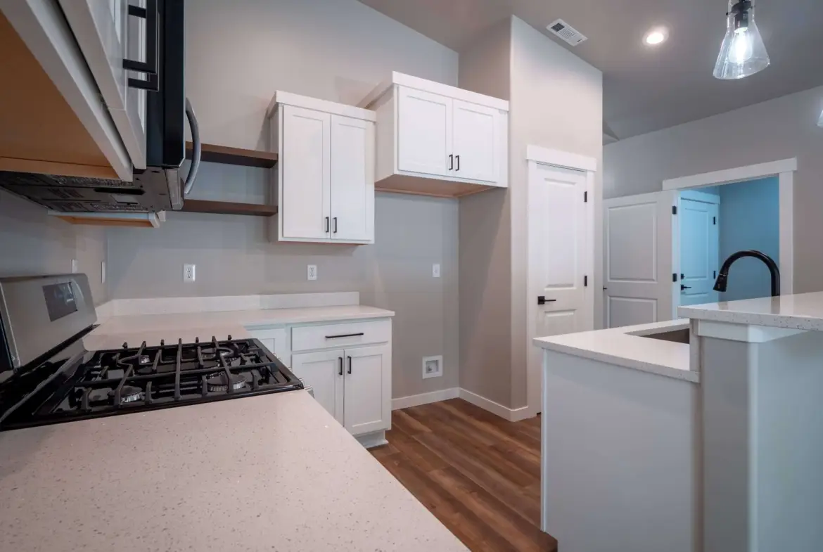 kitchen with white counter tops and white counters