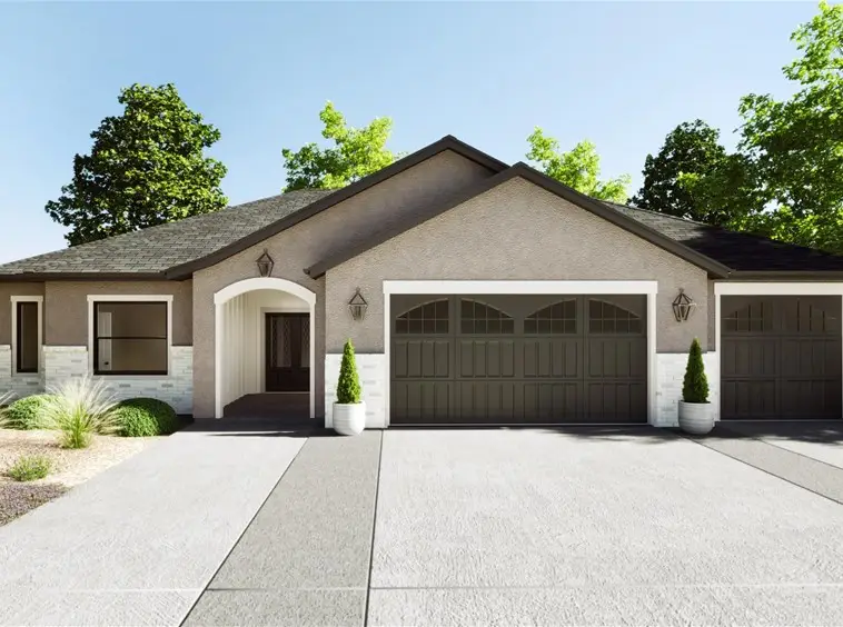 a grey house with a three car garage